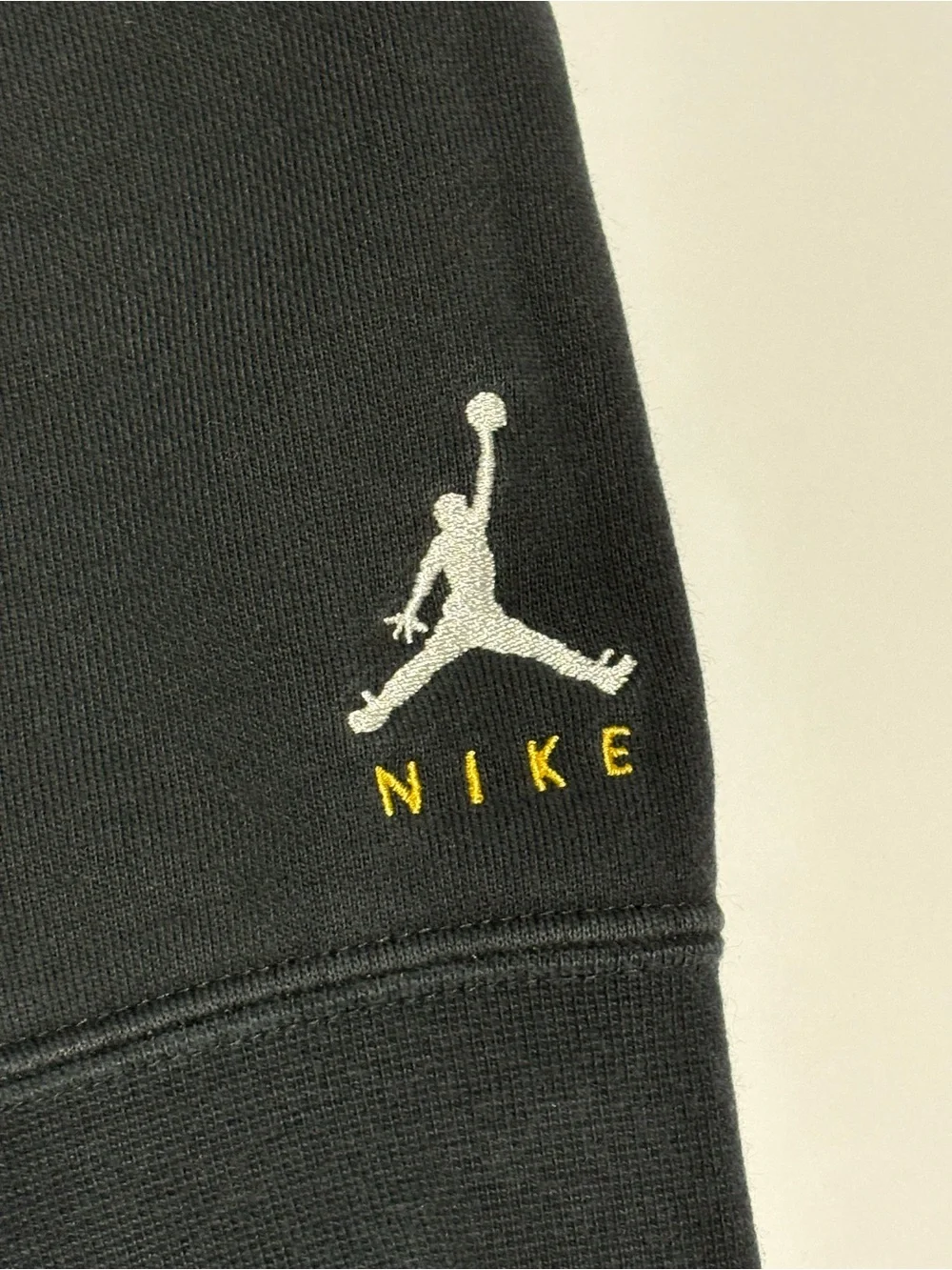 Jordan Black Crewneck Sweater with Gold Accents